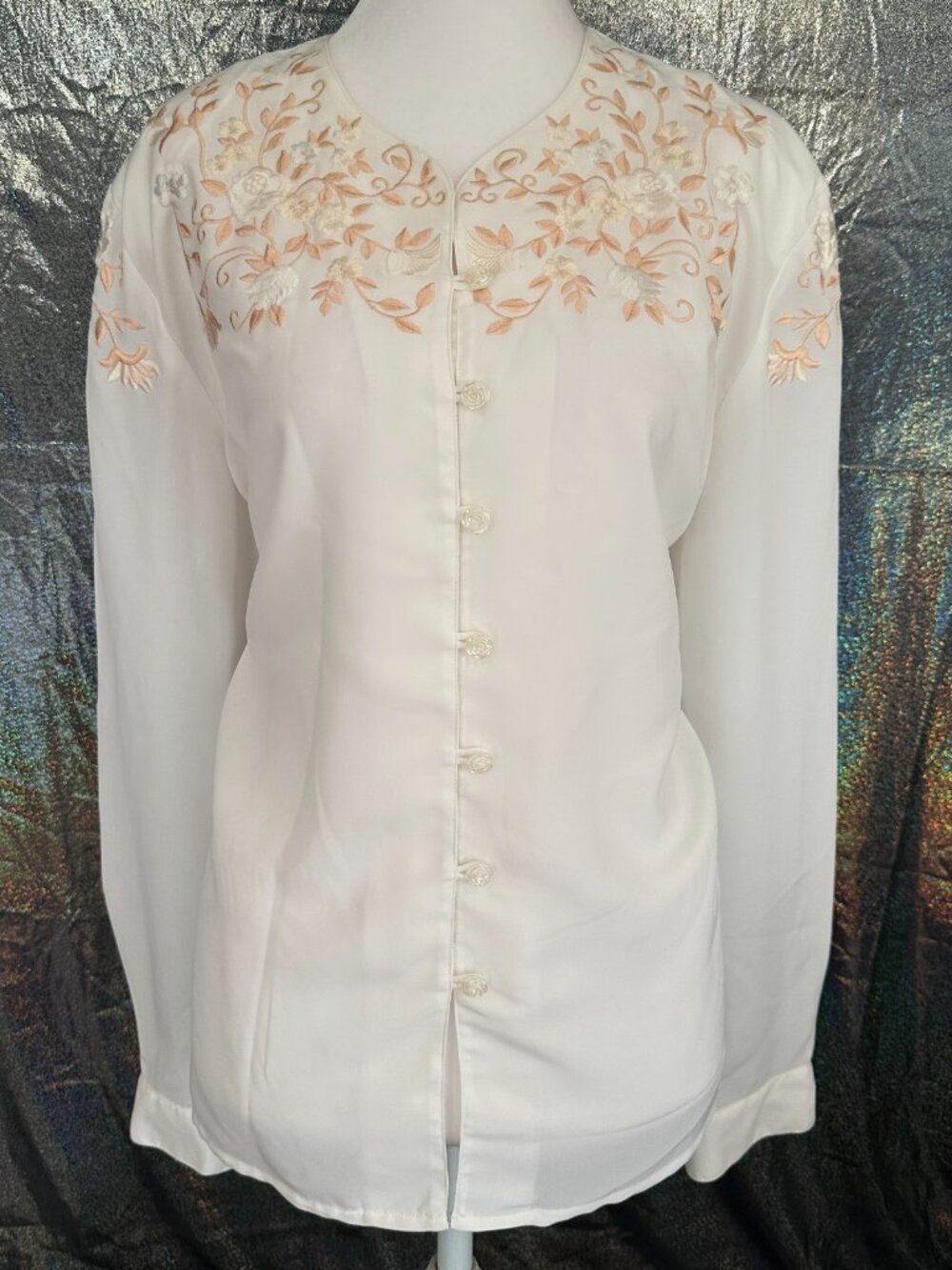 Ladies White Blouse with a Beautiful Embroidery on the Top.